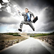 Businessman running on the road