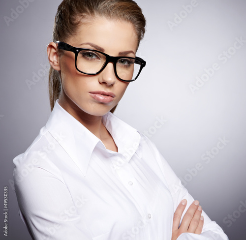 Photo: successful business woman. Isolated over white background successful business woman. Isolated over white background