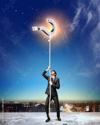 Photo: Image of businessman climbing rope Image of businessman climbing rope