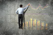 businessman drawing diagram