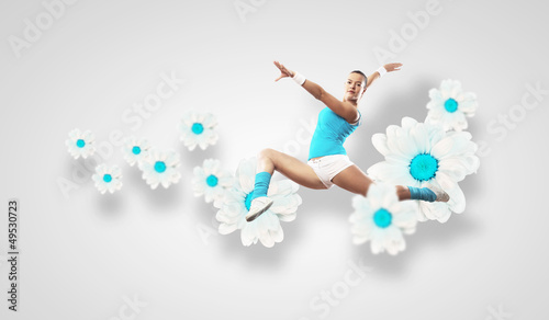 Photo: Image of sport woman jumping Image of sport woman jumping