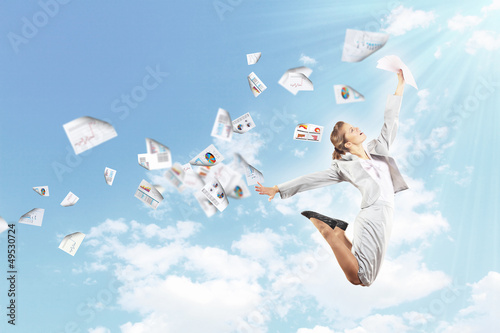 Photo: Image of jumping businesswoman Image of jumping businesswoman