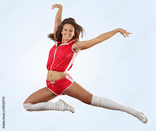 Photo: cheerleader girl jumping cheerleader girl jumping