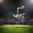 football player striking the ball