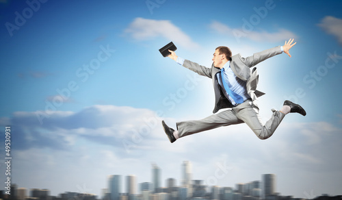 Photo: Image of running businessman Image of running businessman