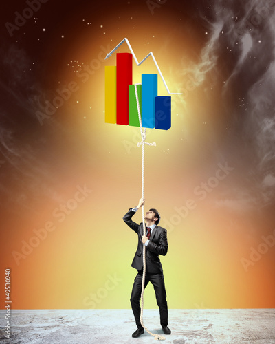 Photo: Image of businessman climbing rope Image of businessman climbing rope