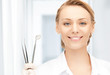 dentist with tools