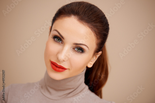Photo: Gorgeous brunette with red lipstick Gorgeous brunette with red lipstick