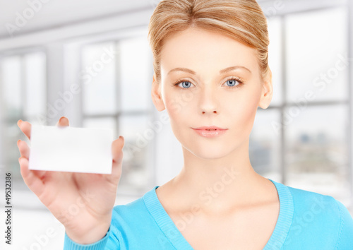 Photo: attractive businesswoman with business card attractive businesswoman with business card