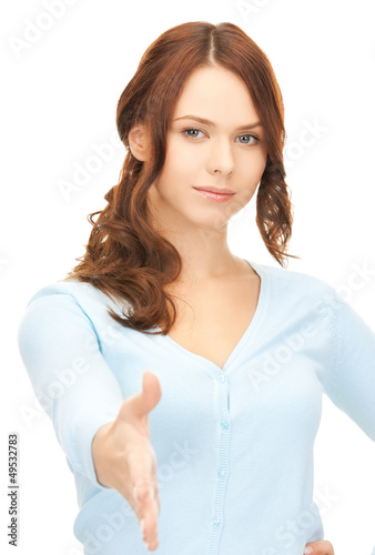 Photo: woman with an open hand ready for handshake woman with an open hand ready for handshake