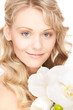 lovely woman with orchid flower
