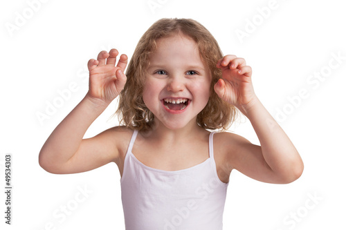 Photo: Little cheerful girl playfully scare someone Little cheerful girl playfully scare someone