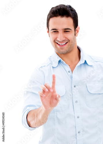 Photo: Man touching a screen Man touching a screen
