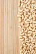 Peeled cashew  lying on a bamboo mat