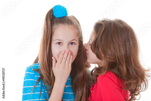 Photo: kids whispering gossip secrets or scandal kids whispering gossip secrets or scandal