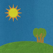 Moutain and tree landscape in stitch style on fabric background