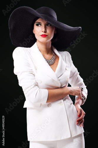 Photo: Retro style woman with bright makeup Retro style woman with bright makeup
