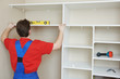 Photo: Wardrobe joiner at installation work Wardrobe joiner at installation work