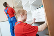 Photo: Wardrobe joiners at installation work Wardrobe joiners at installation work
