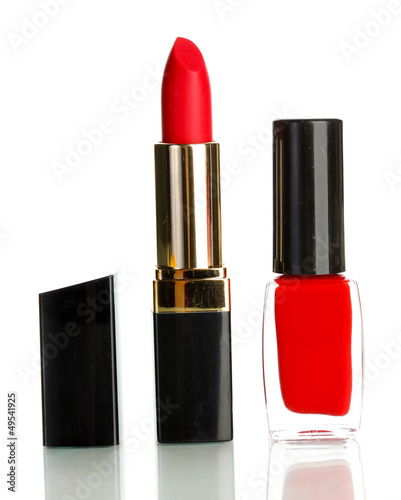 Photo: Beautiful red lipstick and nail polish isolated on white Beautiful red lipstick and nail polish isolated on white