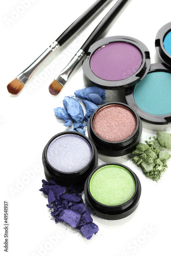 Photo: Beautiful bright eye shadows isolated on white Beautiful bright eye shadows isolated on white