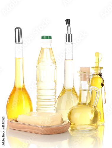 Photo: Different types of oil isolated on white Different types of oil isolated on white