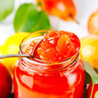 Tasty homemade jam of red pear close-up