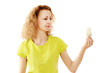 A woman with an energy-saving bulb in her hands