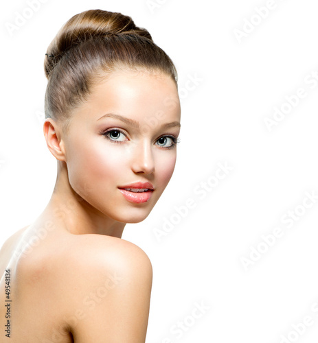 Photo: Beauty Teenage Girl Portrait isolated on a White Background Beauty Teenage Girl Portrait isolated on a White Background
