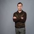 Man in vest isolated on grey background