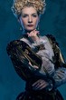 Haughty queen in royal dress
