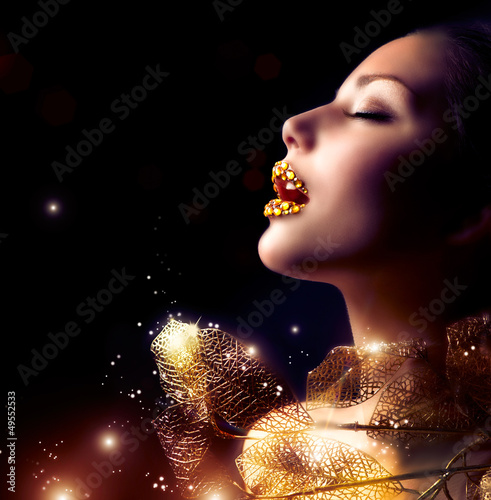 Photo: Luxury Golden Makeup. Beautiful Professional Holiday Make-up Luxury Golden Makeup. Beautiful Professional Holiday Make-up