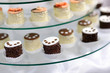 Decorated cupcakes on a glass plate