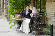 Bride and groom drinking wine