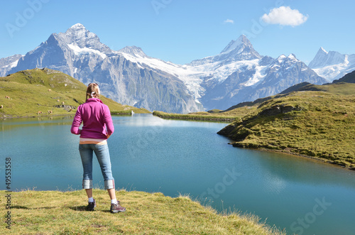 Photo: Traveler against Swiss Alps Traveler against Swiss Alps