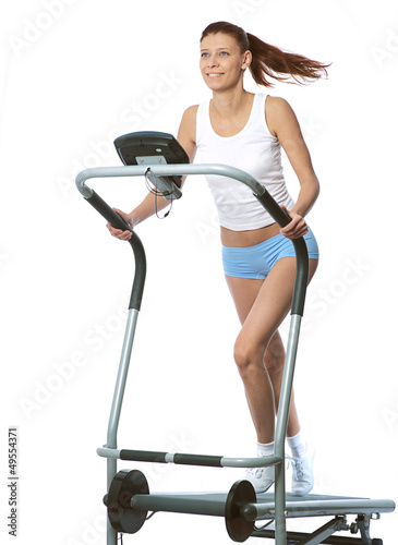 Photo: woman on a running simulator woman on a running simulator