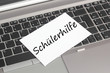 Computer mit Zettel Schülerhilfe