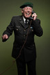 US military general wearing beret. Calling with phone. Studio po