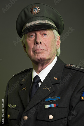 Photo: US military general in uniform. Studio portrait. US military general in uniform. Studio portrait.