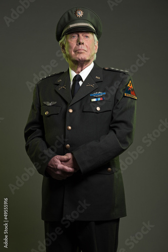 Photo: US military general in uniform. Studio portrait. US military general in uniform. Studio portrait.