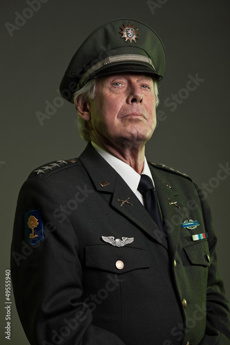 Photo: US military general in uniform. Studio portrait. US military general in uniform. Studio portrait.