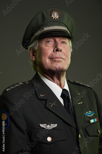 Photo: US military general in uniform. Studio portrait. US military general in uniform. Studio portrait.