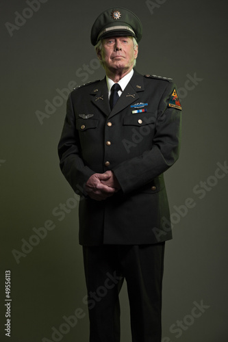 Photo: US military general in uniform. Studio portrait. US military general in uniform. Studio portrait.