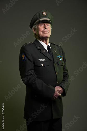 Photo: US military general in uniform. Studio portrait. US military general in uniform. Studio portrait.