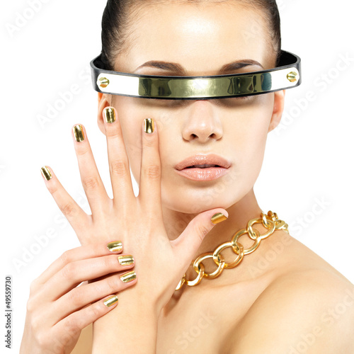 Photo: portrait of woman with golden nails and gold chain portrait of woman with golden nails and gold chain