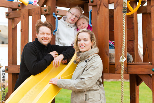 Photo: Family on the playground Family on the playground