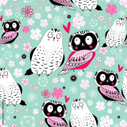Vector: Seamless floral pattern with funny owls in love Seamless floral pattern with funny owls in love