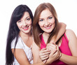 Two women hugging.
