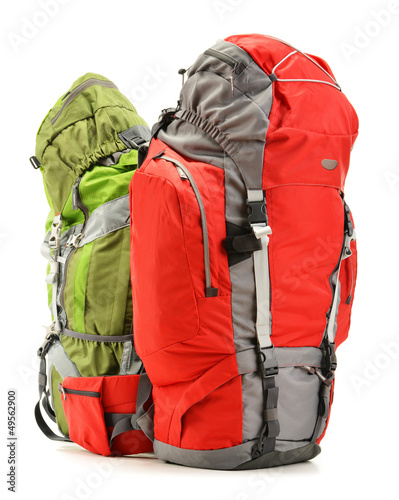 Photo: Two tourist backpacks isolated on white Two tourist backpacks isolated on white