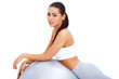 Photo: Cute brunette relaxing after exercises Cute brunette relaxing after exercises